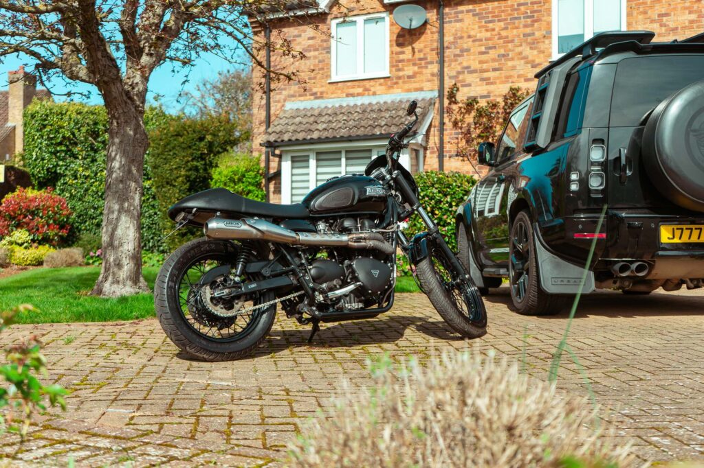 Online Auction of a Triumph Bonneville T100 Custom alongside custom Defender 90 built by Urban.